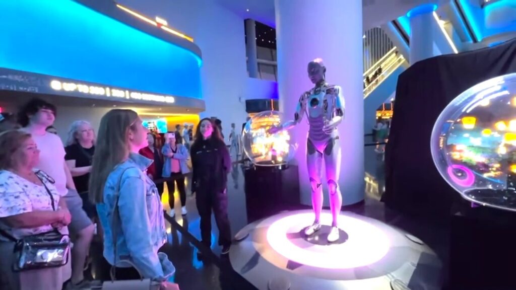 Visitors interact with humanoid robot at the Sphere in Las Vegas