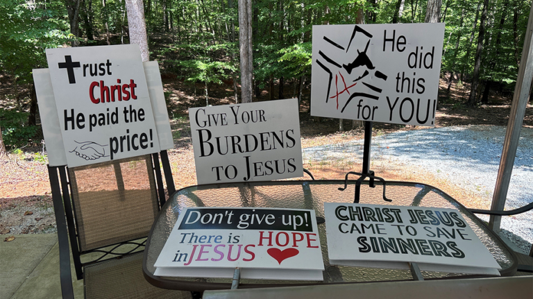 South Carolina man told he needs a permit to hold a sign about his faith on public sidewalk