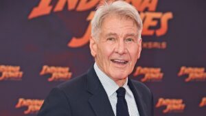 Harrison Ford, 82, says he should be 'sitting on my a--,' but loves working