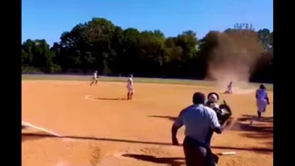 Virginia softball player battles dust devil to make incredible play