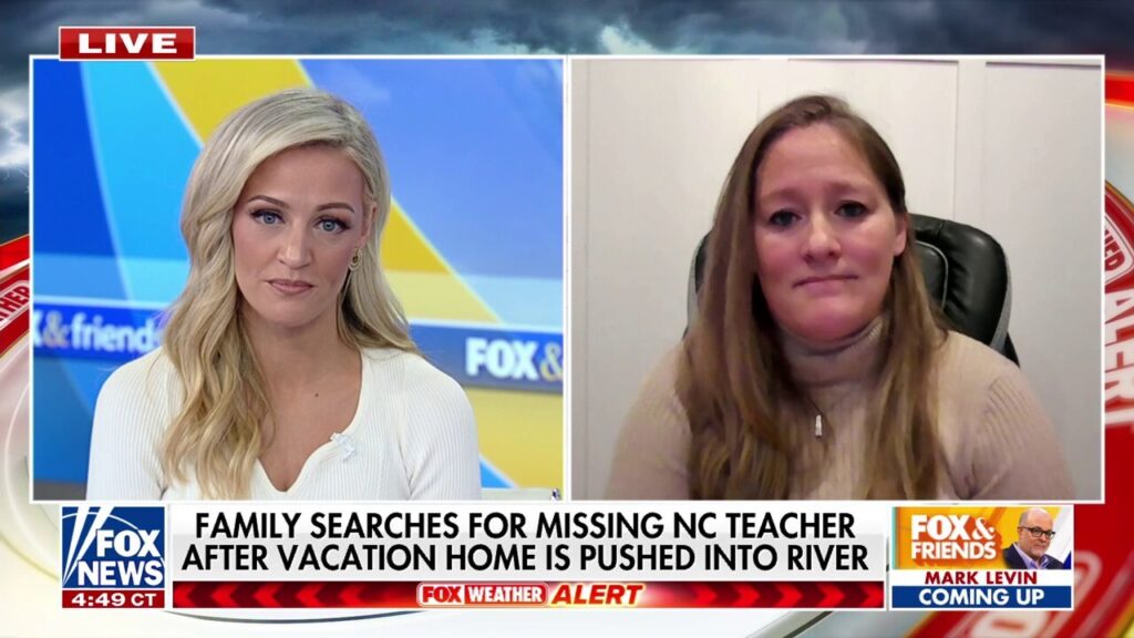 North Carolina teacher still missing after floodwaters swept away home, daughter says