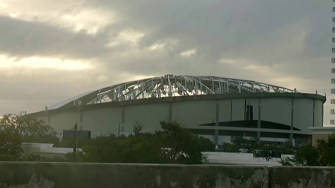 Daylight reveals Tampa stadium's destroyed roof