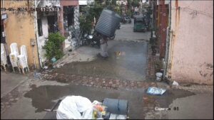 Woman escapes injury after water tank falls from building, lands perfectly around her