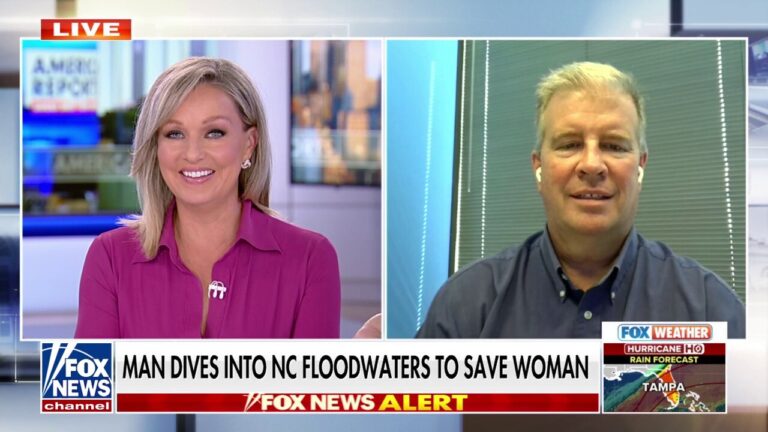 Brave man dives into North Carolina floodwaters to save woman