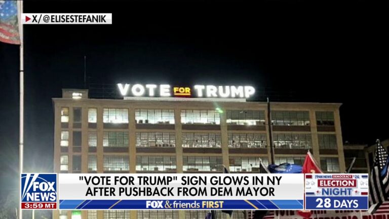 New York Trump sign remains after battle with mayor