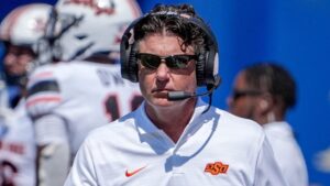 Oklahoma State coach Mike Gundy floats theory about how college football programs keep rosters intact