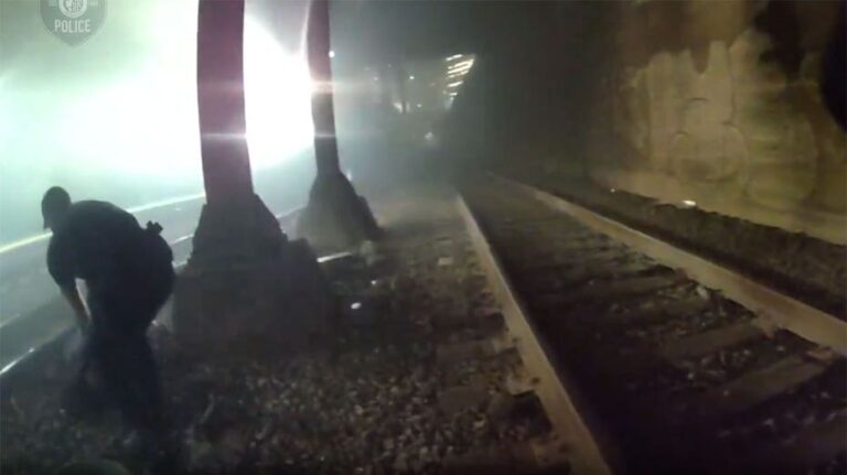 Heart-stopping video shows Seattle police rescue man from tracks moments before train roars past