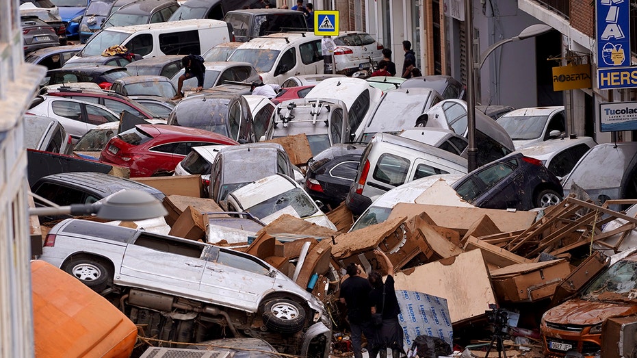 Spain searches for bodies after unprecedented flooding claims at least 158 lives