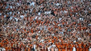 Texas fans launch beer cans, other debris onto field after questionable call