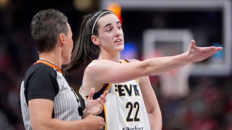 WNBA star Caitlin Clark spotted jawing at referees from the stands during Iowa game