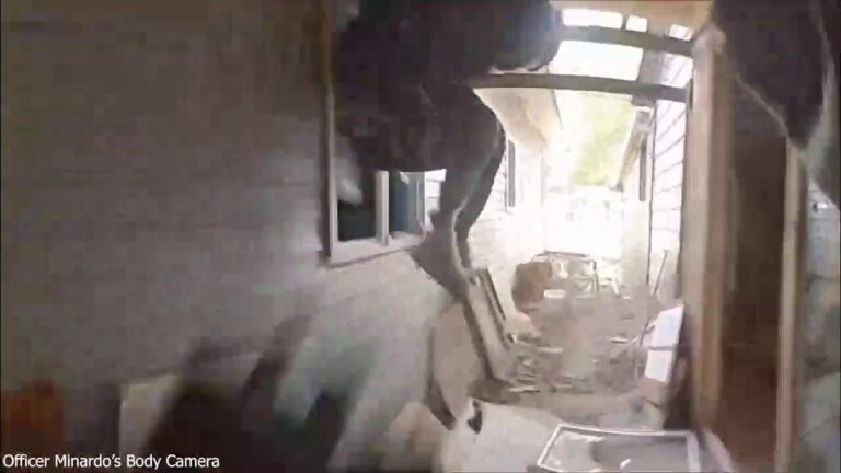 Police bodycam shows officer chasing home invasion suspect who shot him