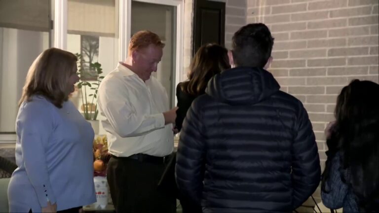 Harris greets Pennsylvania family on porch, asks them to stage 'door knock'