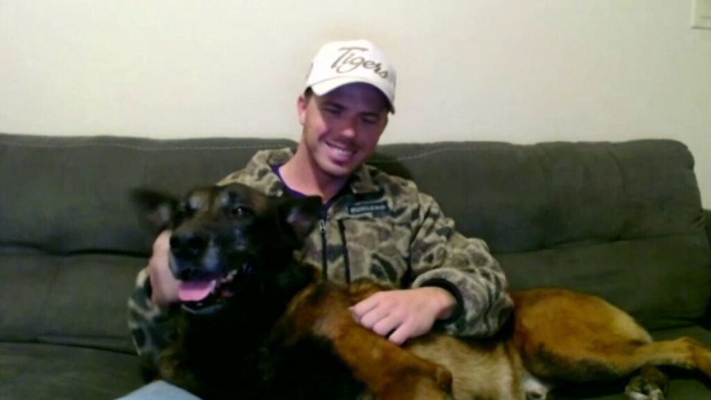 US service member reunites with retired military service dog