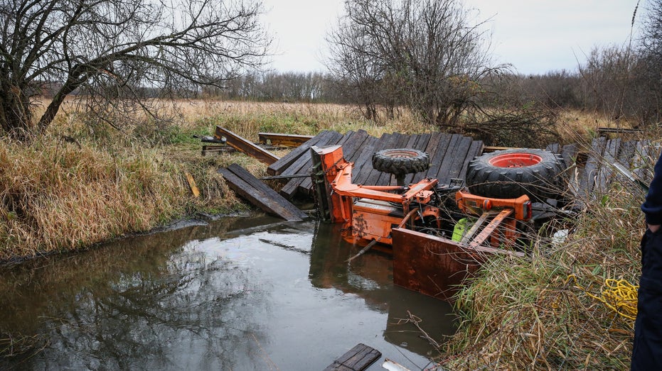 Illinois man rescued after bridge collapse causes tractor to trap him in creek