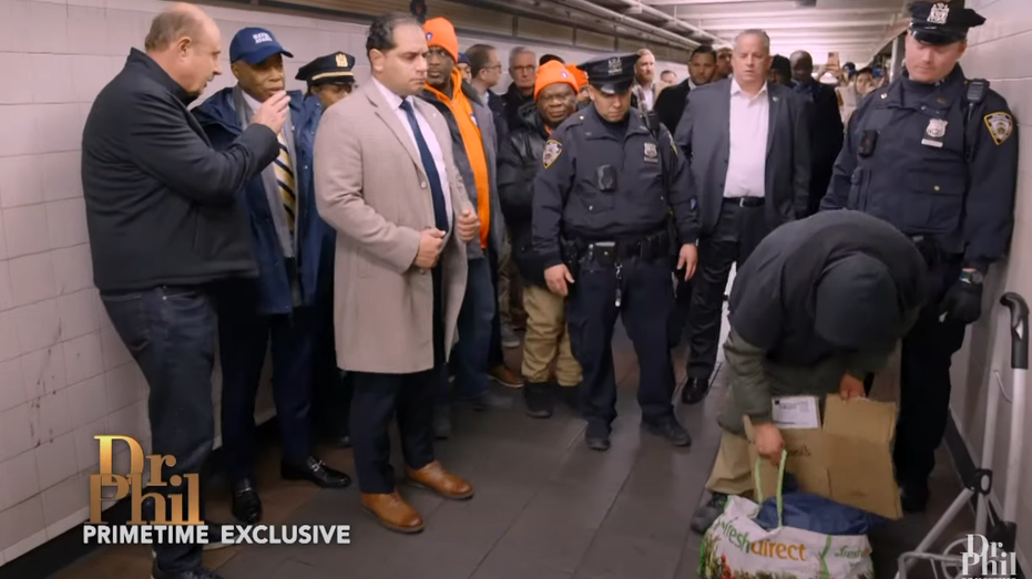 Dr. Phil witnesses tense homeless altercation while touring subway with Mayor Adams