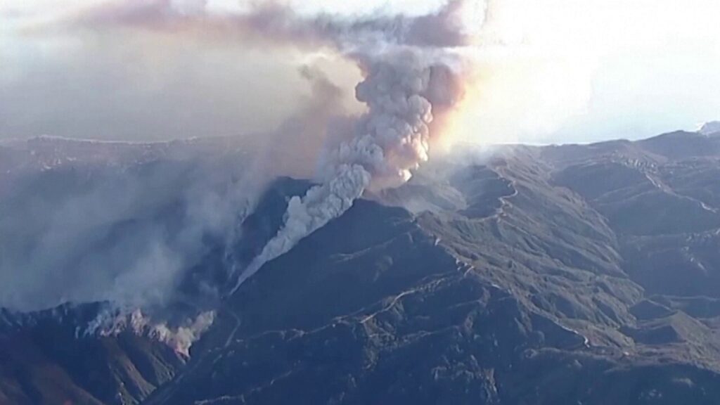 Thousands of Malibu residents under evacuation orders as wildfire surrounds upscale Southern California city