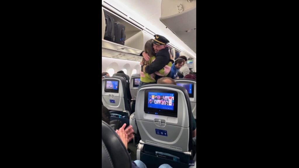 United Airlines pilot hugs passenger who saved his life with bone marrow donation