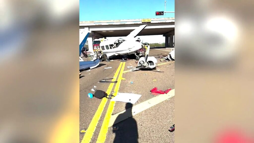 Plane splinters in half following crash on busy Texas roadway