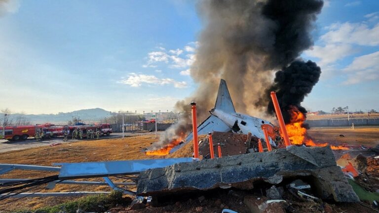 Plane veers off airport runway in South Korea and crashes, killing at least 23: report