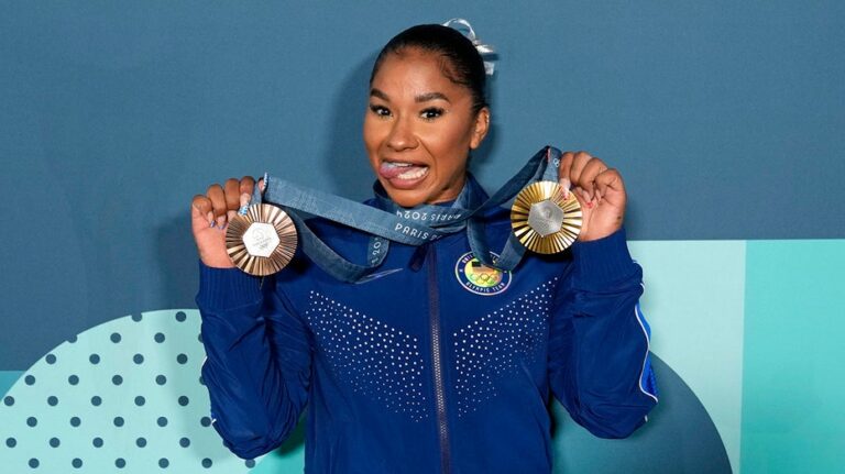 Jordan Chiles flaunts Olympic medal in New Year's post amid ongoing appeal over losing bronze to Romania