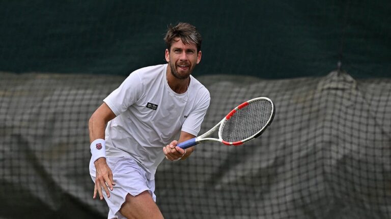 Tennis player hits woman in front row with errant racket throw