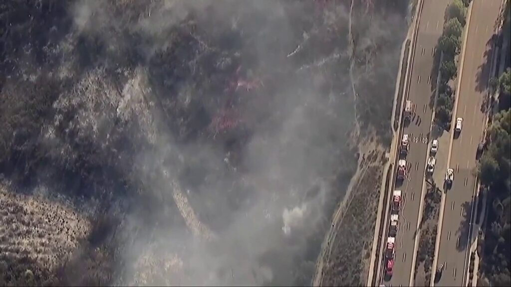 Brush fire threatening homes near San Diego