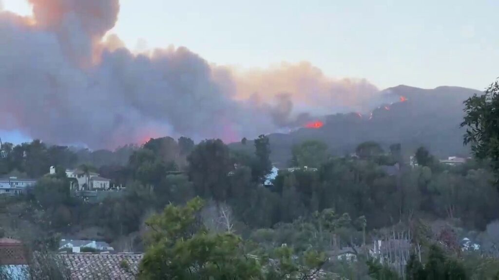 Palisades Fire in Southern California threatens people, homes