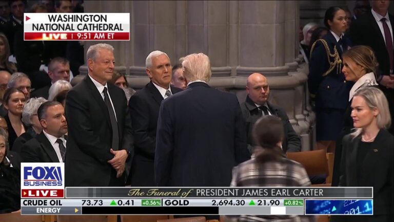 Trump and Pence shake hands at Former President Carter's funeral