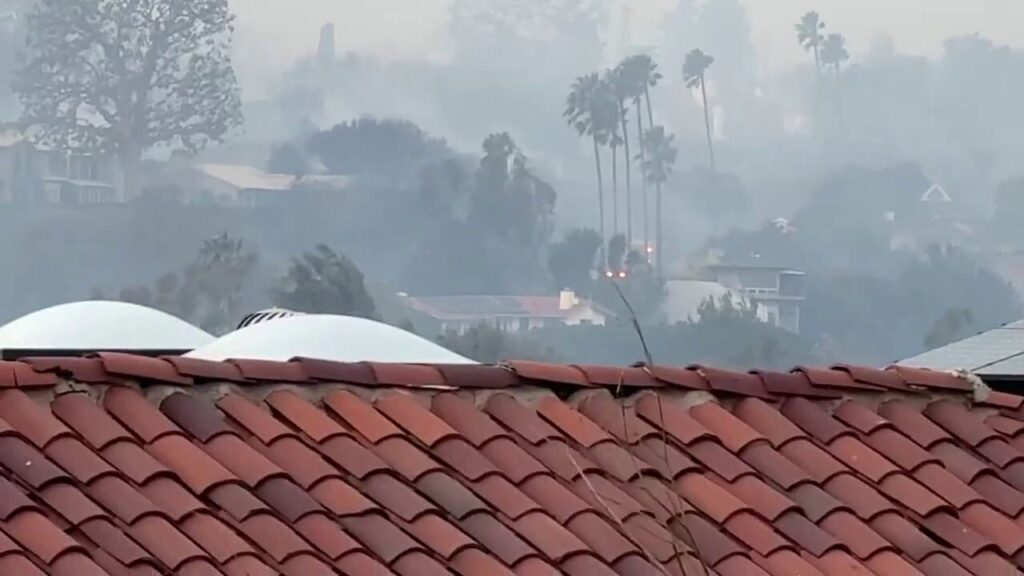 California neighborhood smolders amid wildfire tragedy