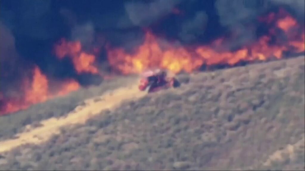 LA County Fire Department bulldozer battles Hughes Fire; residents advised to evacuate