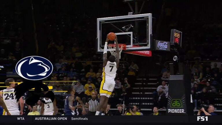 Seydou Traore throws down an alley-oop off an inbound pass to extend Iowas lead over Penn State