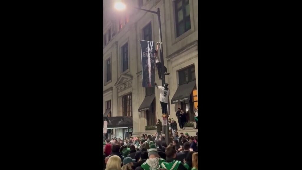 Eagles fan drops from pole while celebrating team's NFC title win