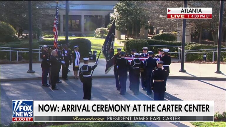 Jimmy Carter's motorcade arrives at Carter Center