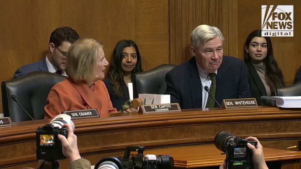 Ranking Member Whitehouse presents new chairman Capito with gavel