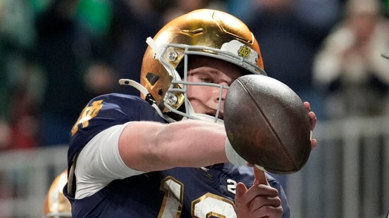 Notre Dame's Riley Leonard points to favorite Bible verse after scoring opening TD in national title game