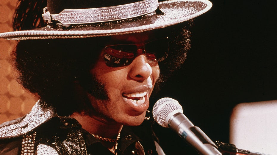 Sly Stone’s daughter once snorted lines of sidewalk chalk to mimic his cocaine use: doc