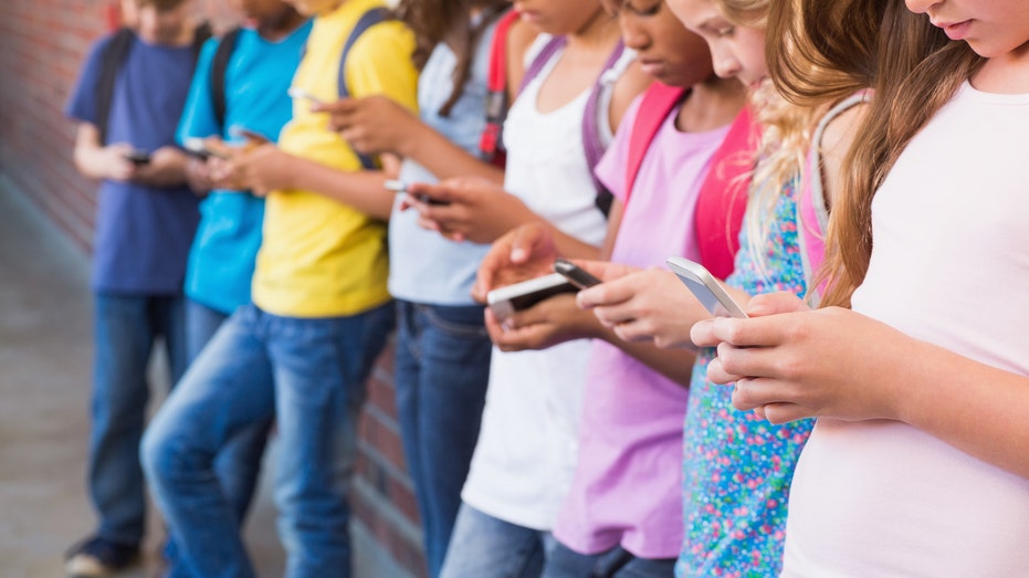 Teens spend more than a quarter of their time at school on phones, new study finds