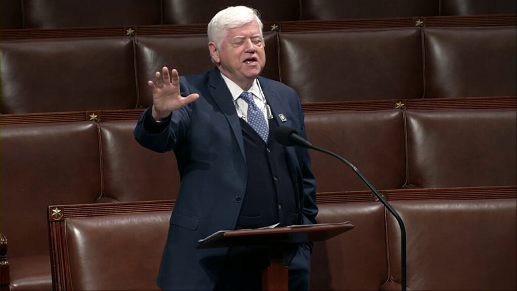 Rep. John Larson, D-Ct., freezes while speaking on the House floor