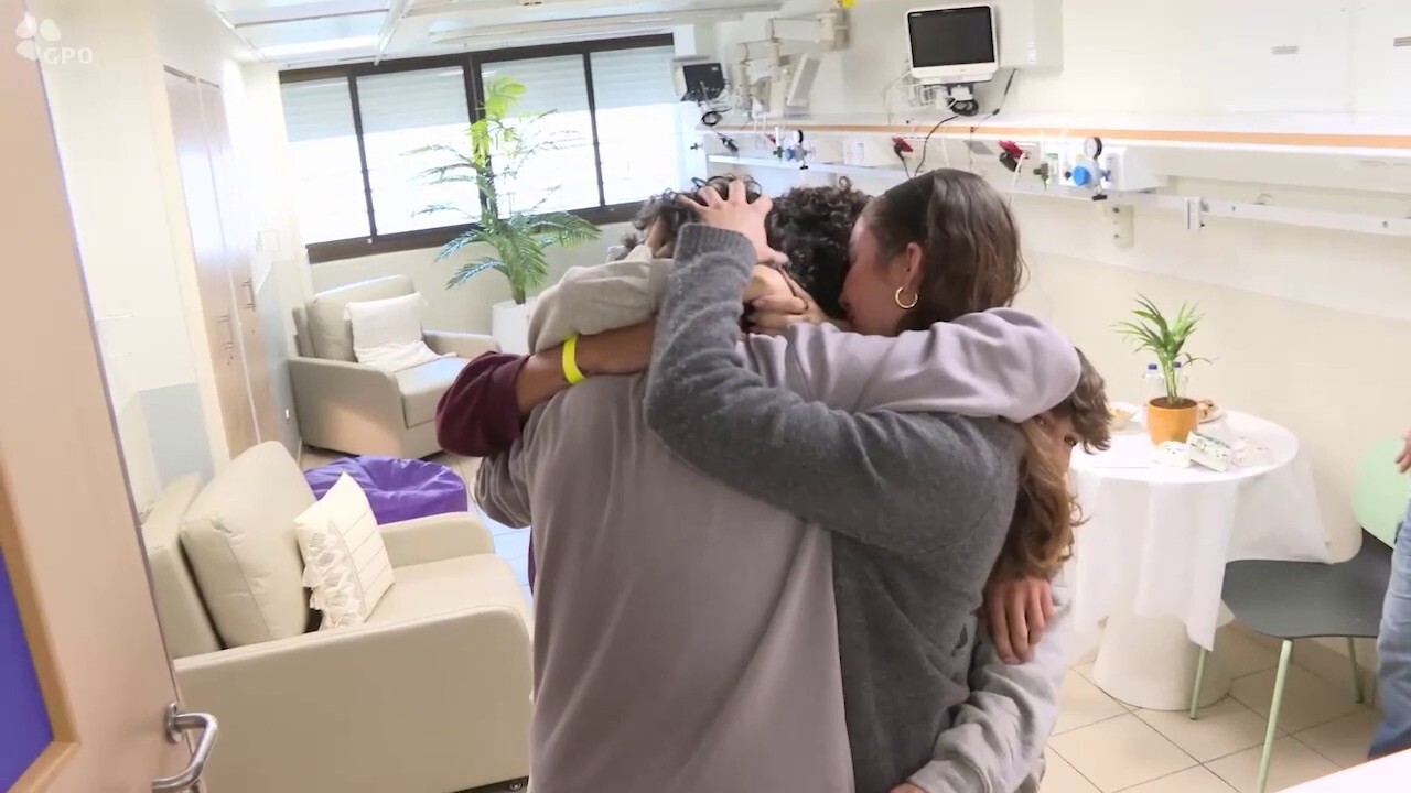 Ofer Kalderon's reunion with his children after 484 days in Hamas captivity. Credit: GPO