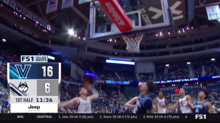 Jordann Dumont gets a fast break layup, extending Villanova's lead over UConn