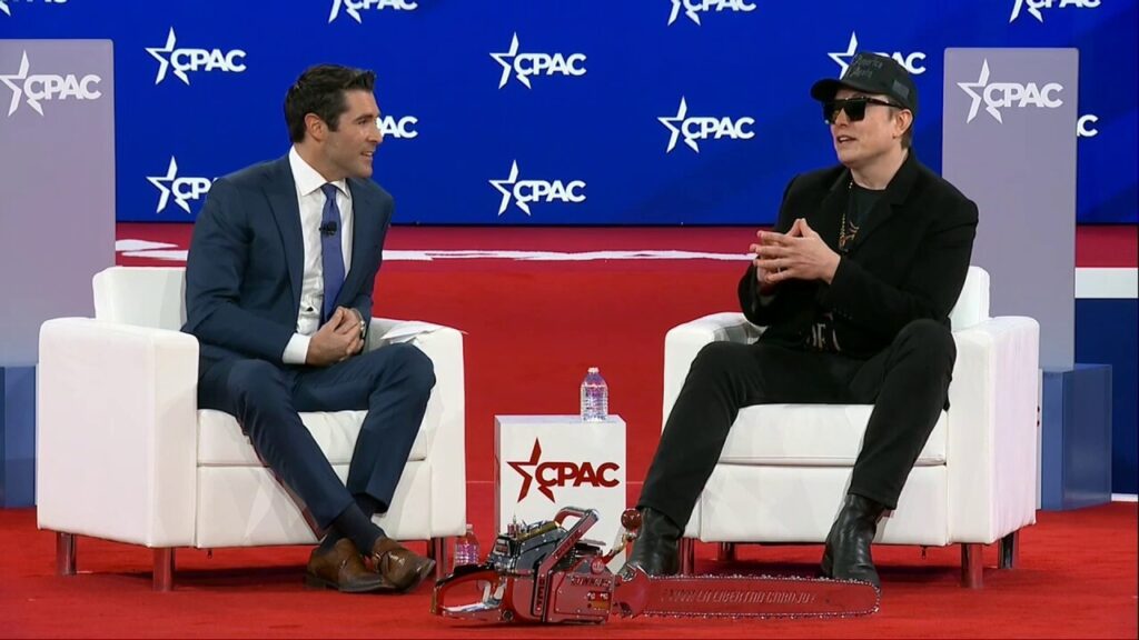 Chainsaw wielding Elon Musk makes ‘Dark MAGA’ appearance at CPAC