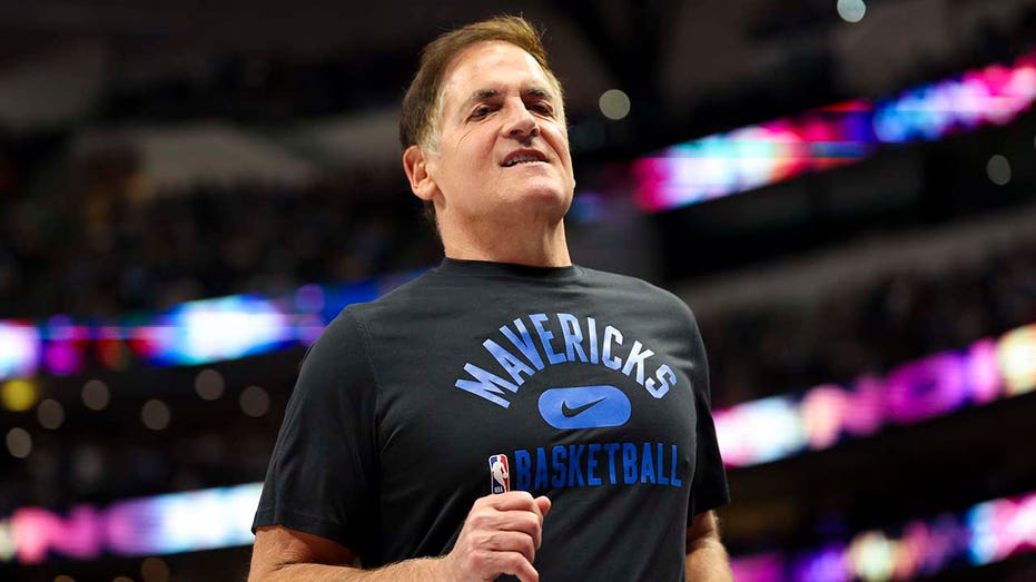 Mavericks minority owner Mark Cuban invites fan ejected for 'Fire Nico' protest back to sit courtside