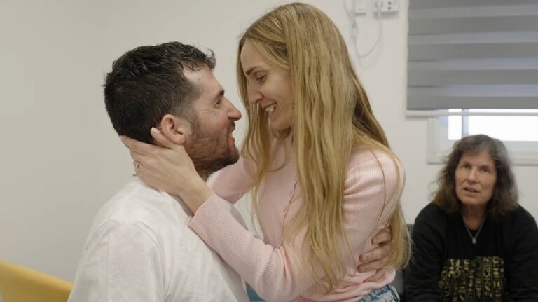 American-Israeli hostage released by Hamas embraces his wife, family after being apart for nearly 500 days