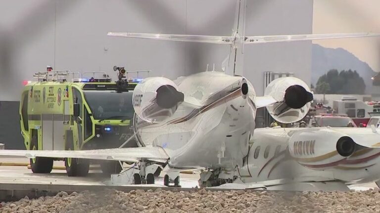 Scottsdale plane crash: 1 dead, 4 injured after small jet smashes into bigger jet as landing gear fails