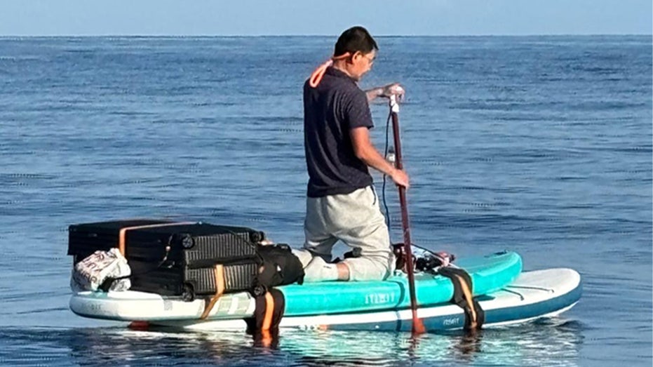 Chinese migrant on paddleboard with suitcase in tow apprehended near Bahamas days after separate Florida bust