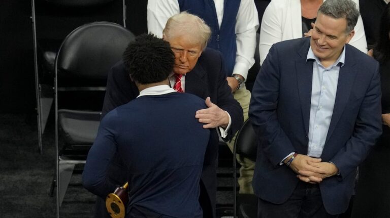 NCAA wrestling champions shake hands with Trump after winning title bouts