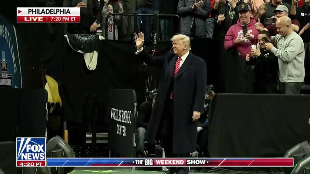 President Trump welcomed by audience chanting 'USA!' at NCAA wrestling championship