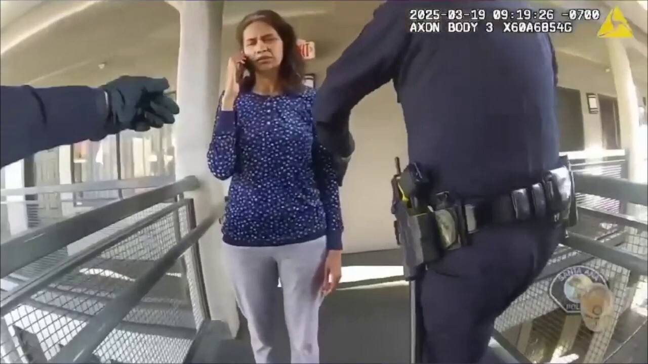 Body camera footage shows a mother with 'blood on her hands' as police arrest her for allegedly killing her young son