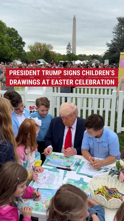 President Trump signs children's drawings at Easter celebration
