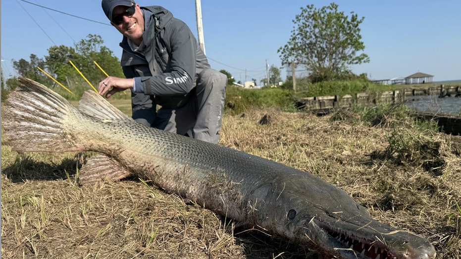 Fisherman catches prehistoric-looking alligator gar in 4-hour ‘epic battle’